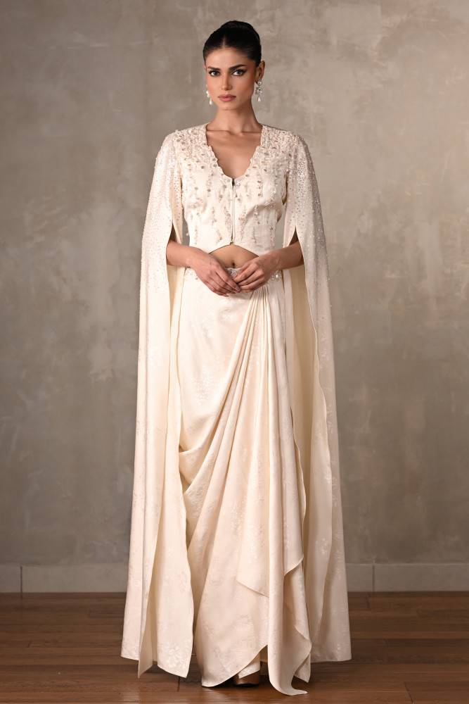 Ethereal Off-White Satin Cape Top & Draped Skirt Set Buy at ₹18995