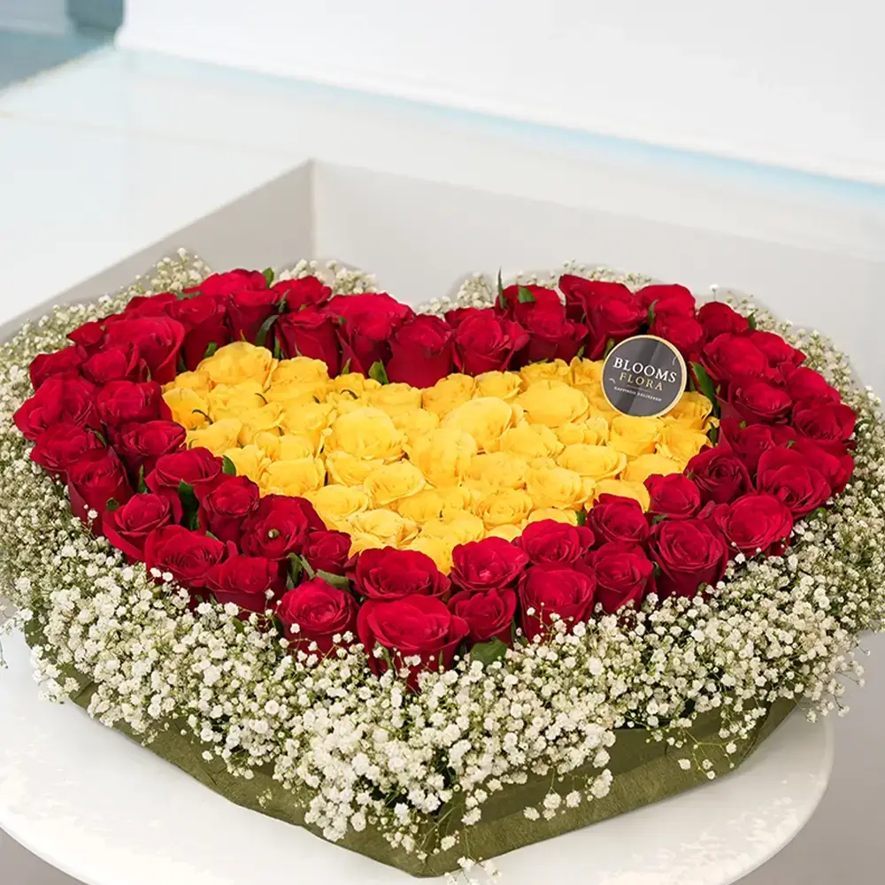 Heart-shaped Arrangement of Red & Yellow Roses