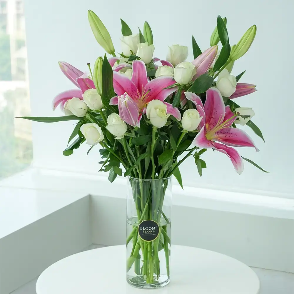 White Roses and Pink Lilies In Vase