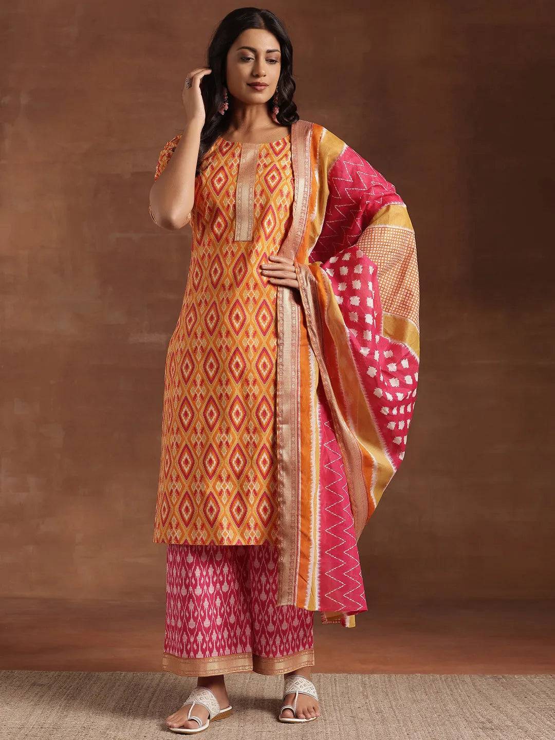 Orange Printed Cotton Straight Suit Wit... Buy only at ₹4199