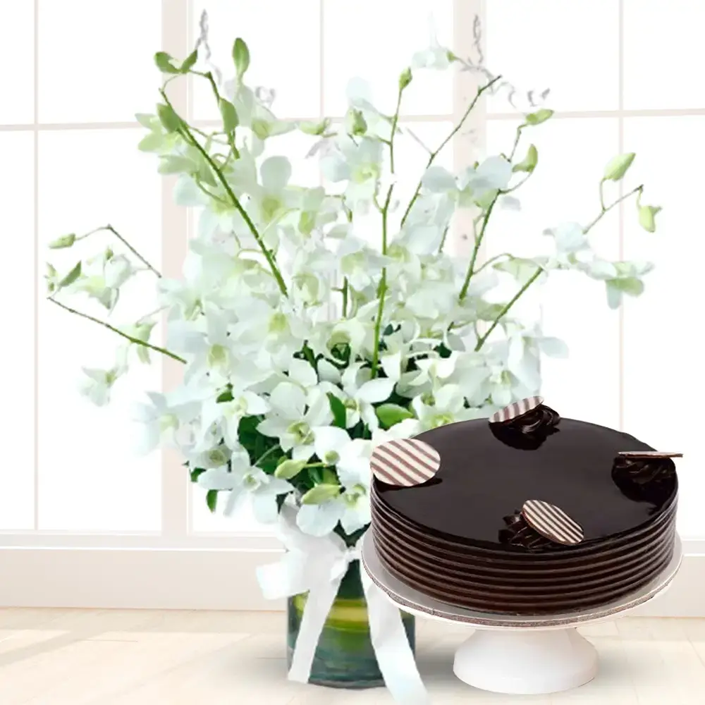 White Orchids In a glass vase & Cake