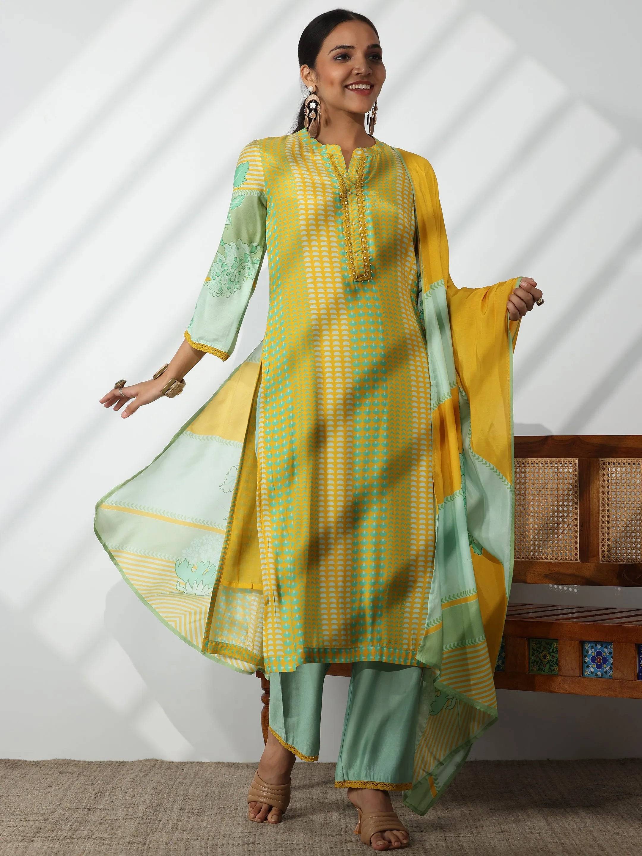 Yellow Printed Cotton Blend Straight Su... Buy only at ₹6999