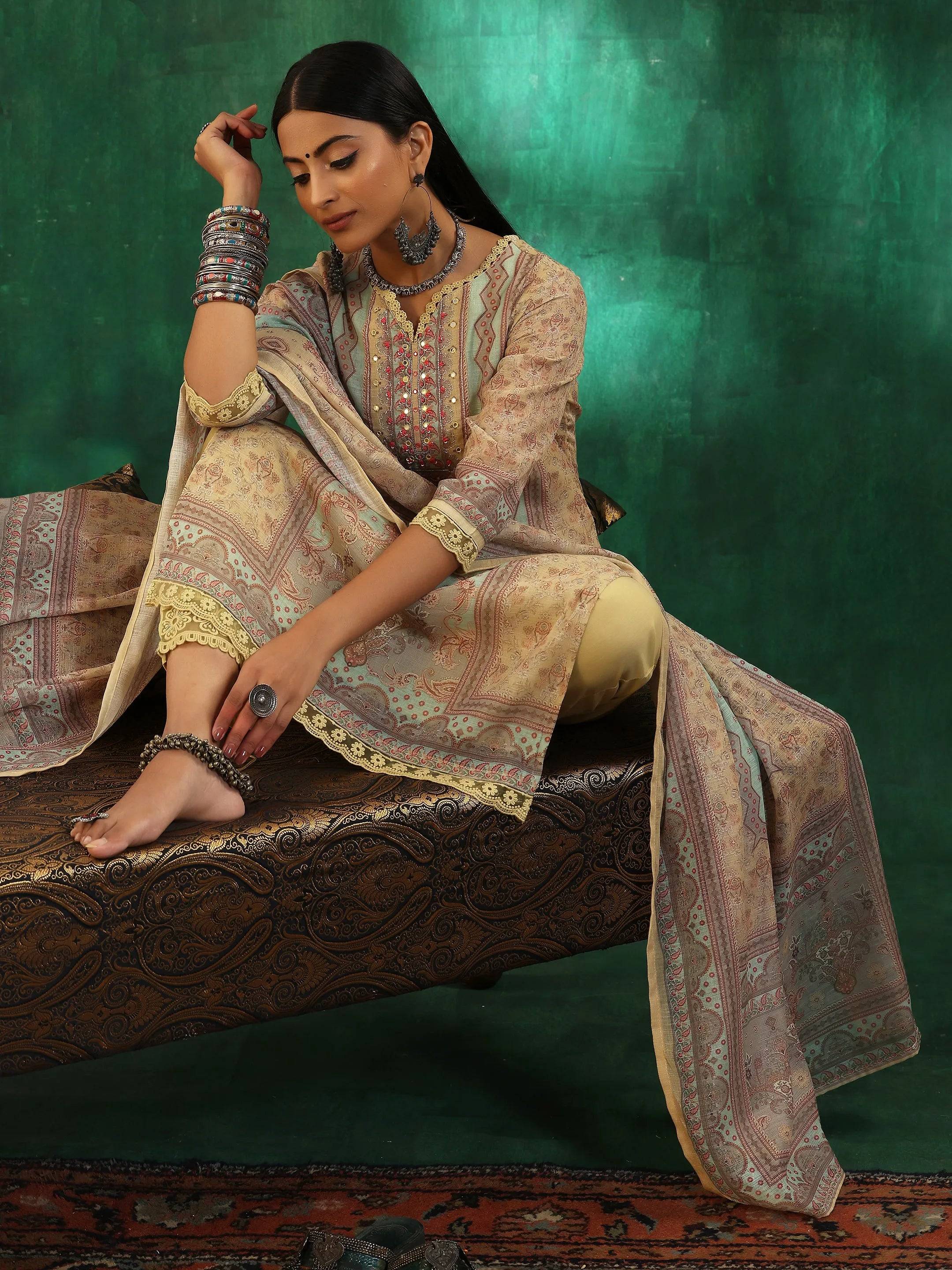 Yellow Printed Cotton Blend Straight Su... Buy only at ₹4999