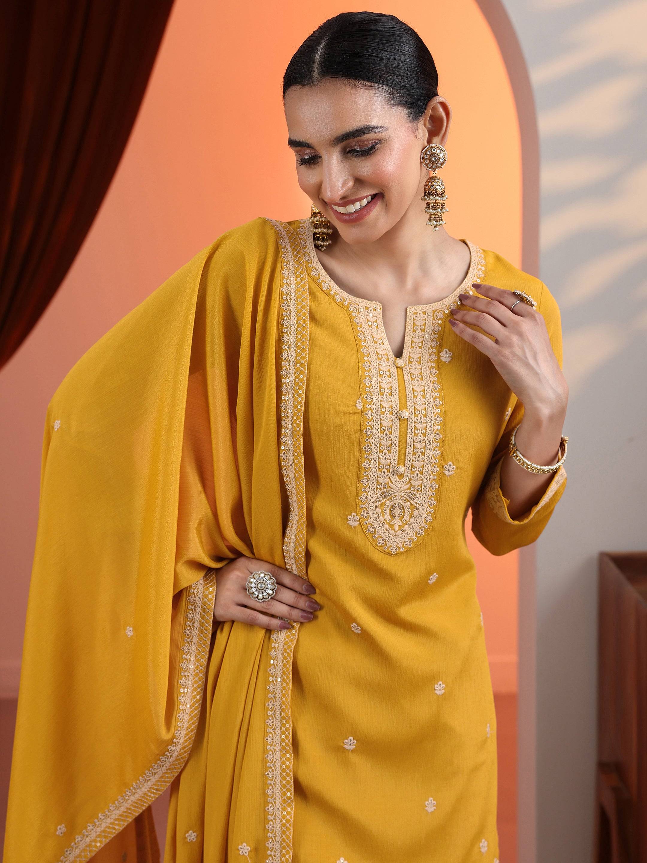 Yellow Embroidered Chinon Straight Suit... Buy only at ₹5499