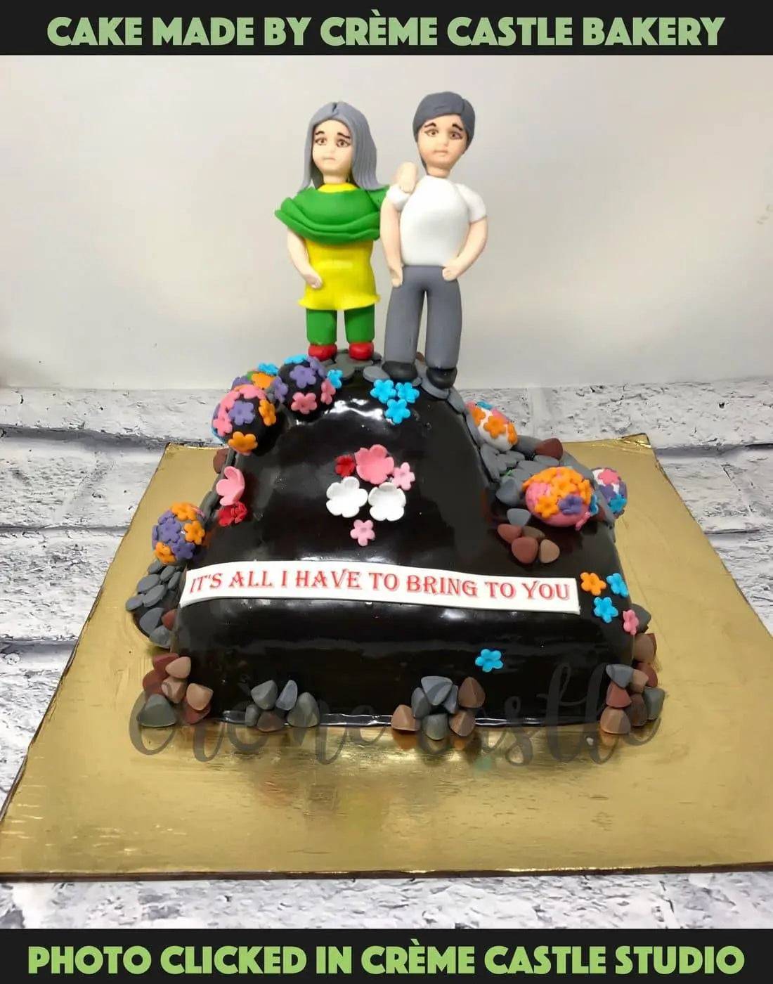 Couple on Hill Cake