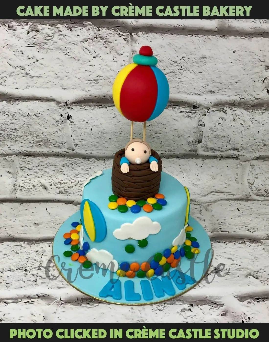 Baby in Balloon Design Cake