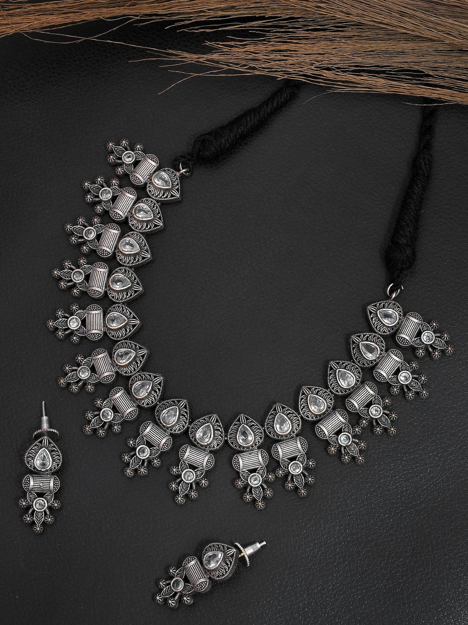 Silver Radiance: Oxidised Banjara Necklace Set with American Diamond Accents