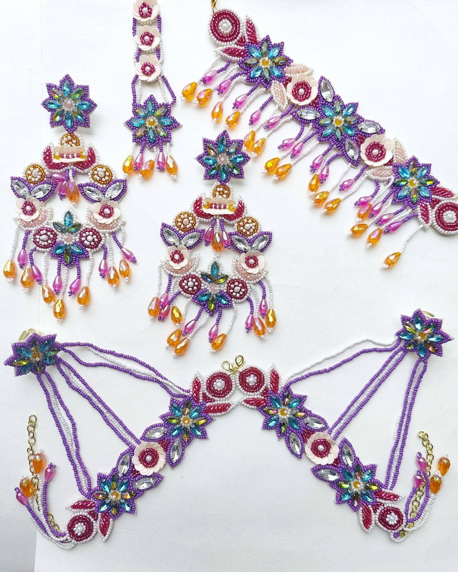 Blossom Chic: Handcrafted Purple-Peach Beaded Floral Set for Haldi-Mehndi