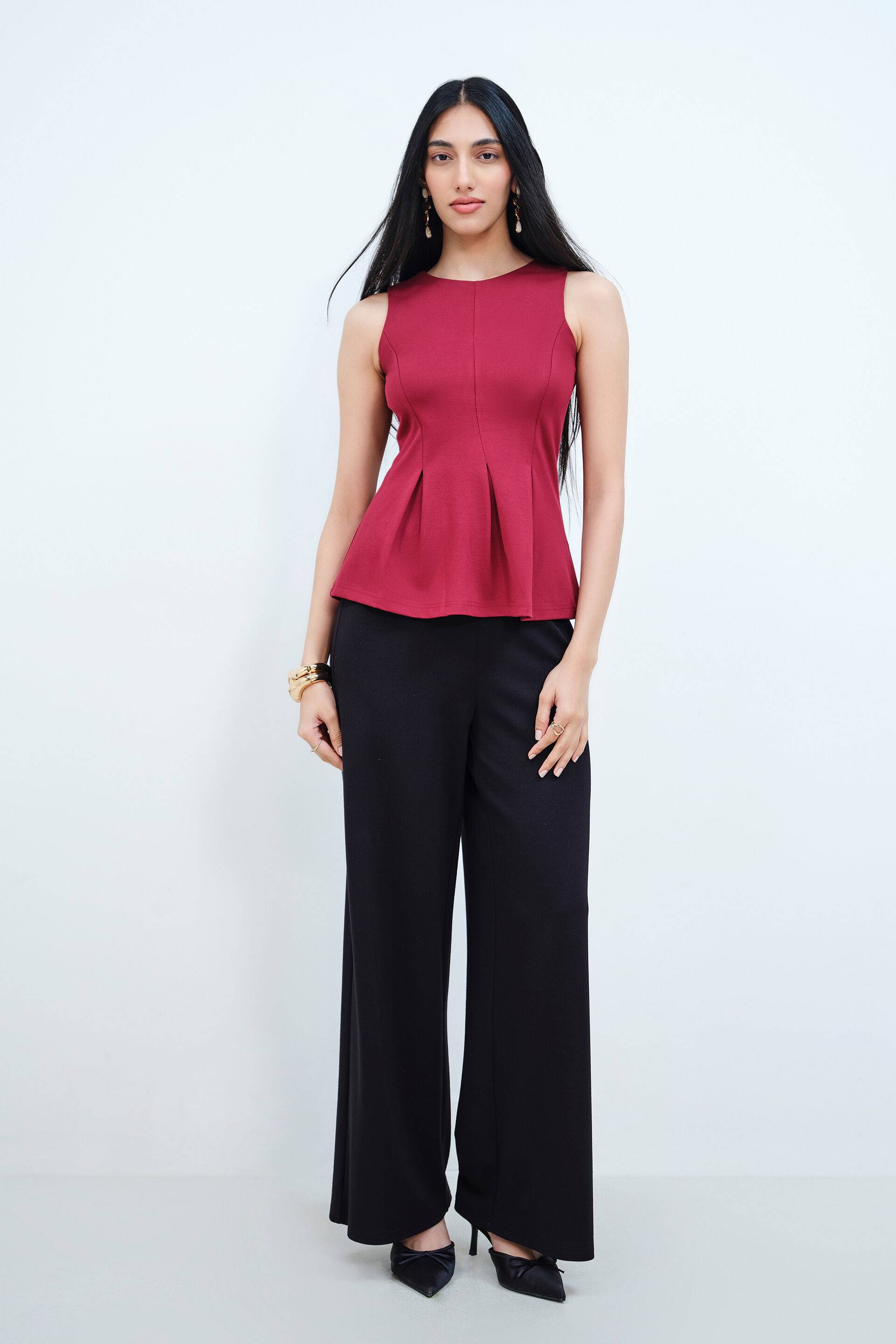 Wine Knitted Peplum Top Buy at ₹2330