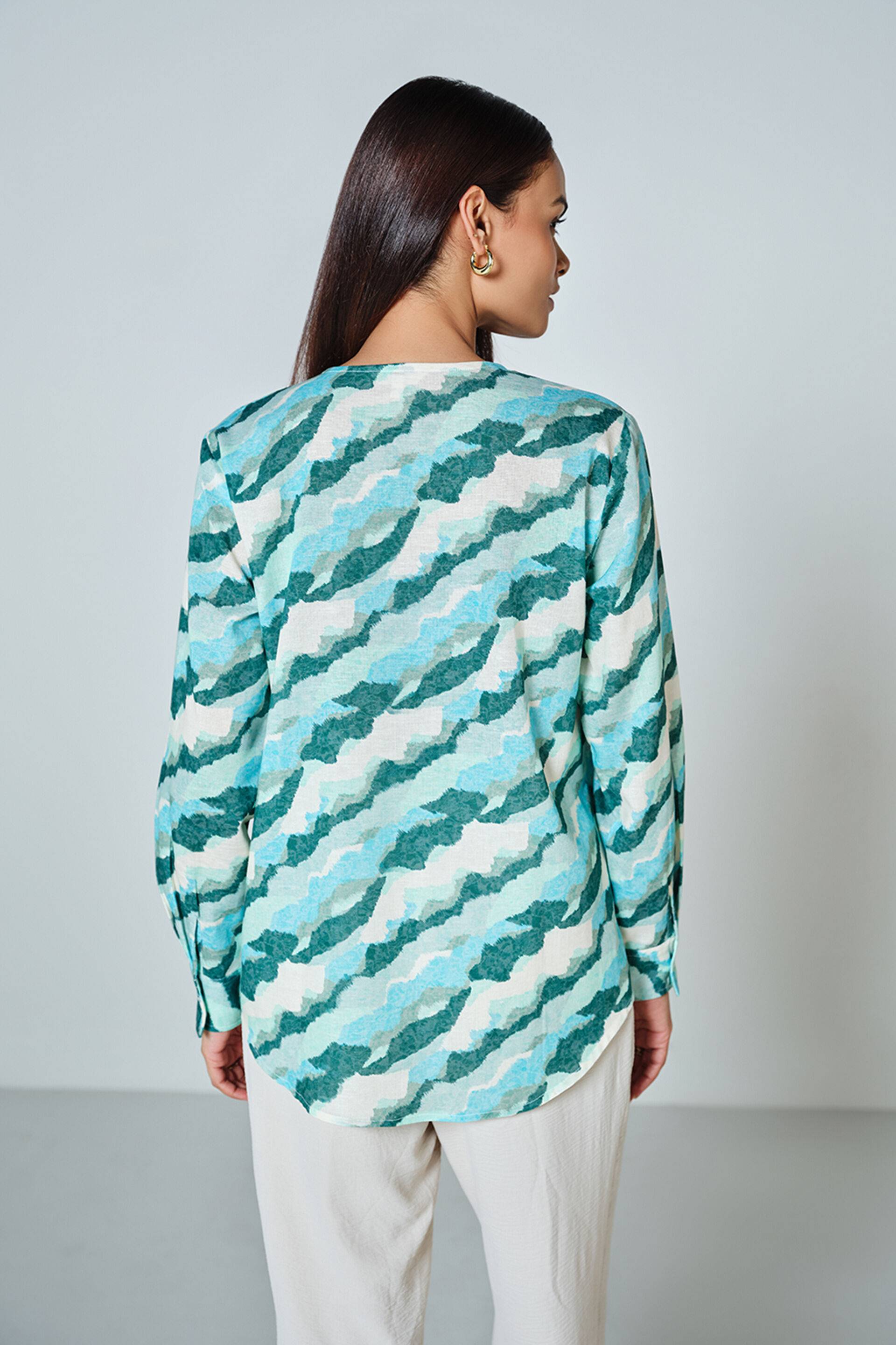 Green Glimmer Top Buy at ₹2146