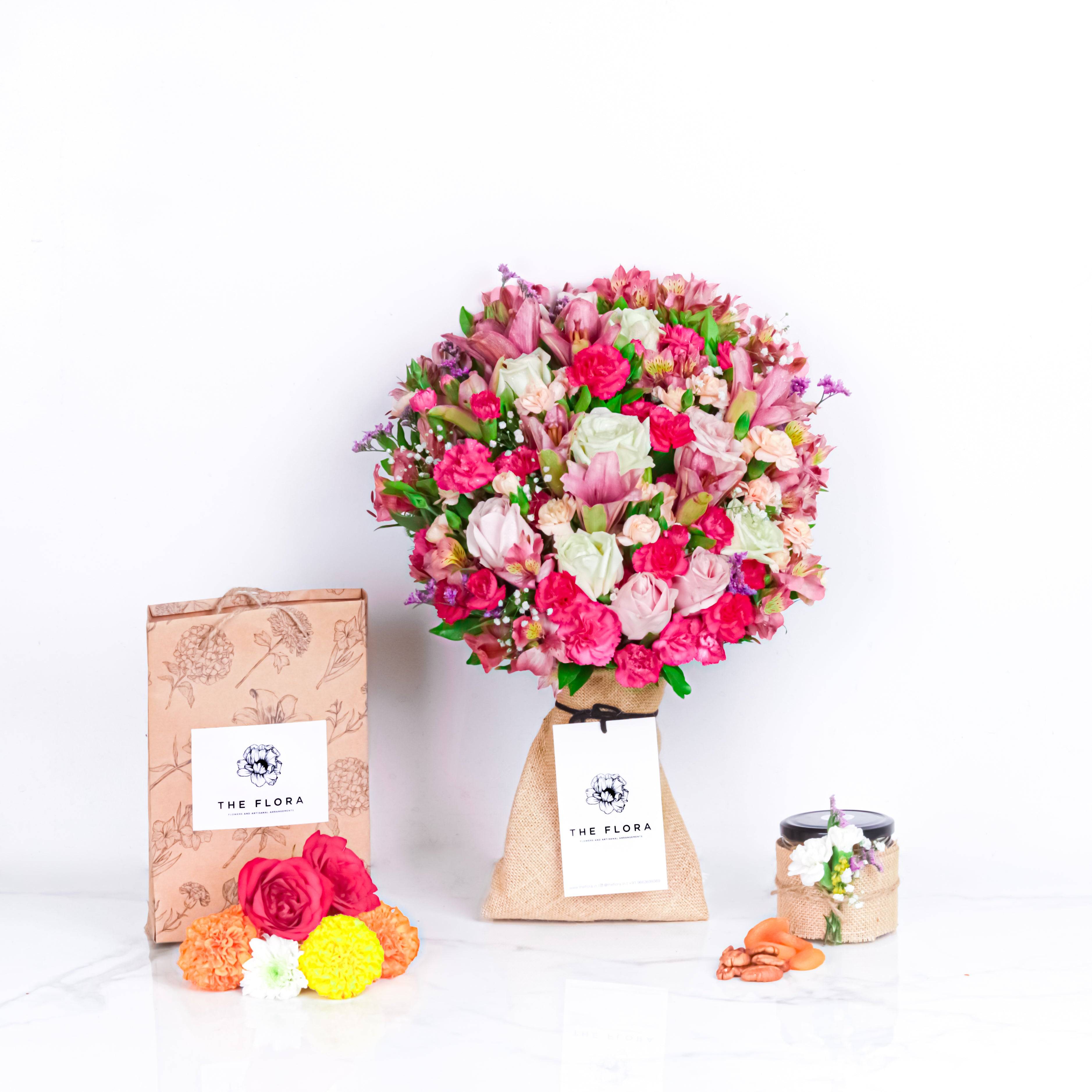 Diwali Treasure Trove (Bouquet with Puja flowers, Dried Apricots & Pecan nuts) Buy at ₹2575