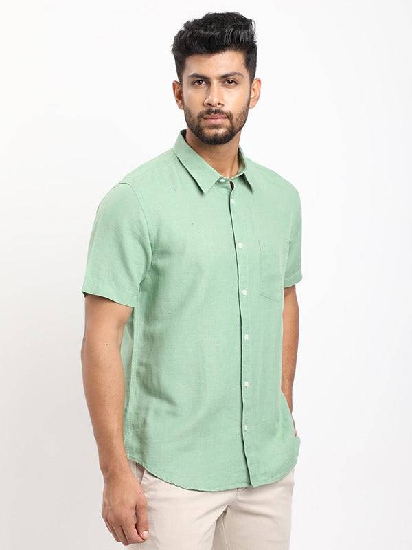 Men Solid Half Sleeve Cotton Blend Shirt