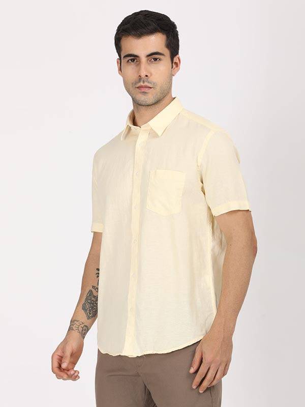 Men Solid Half Sleeve Cotton Blend Shirt