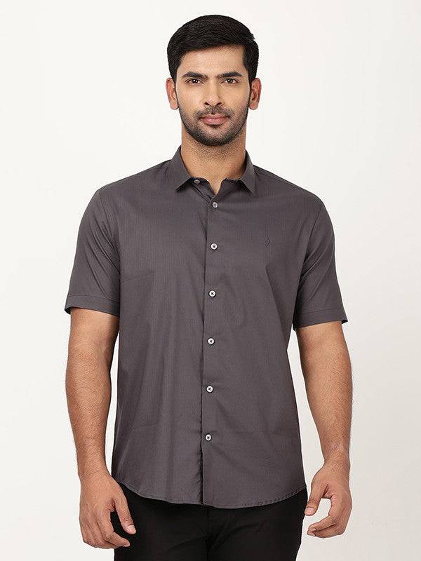 Men Solid Half Sleeve Cotton Blend Shirt