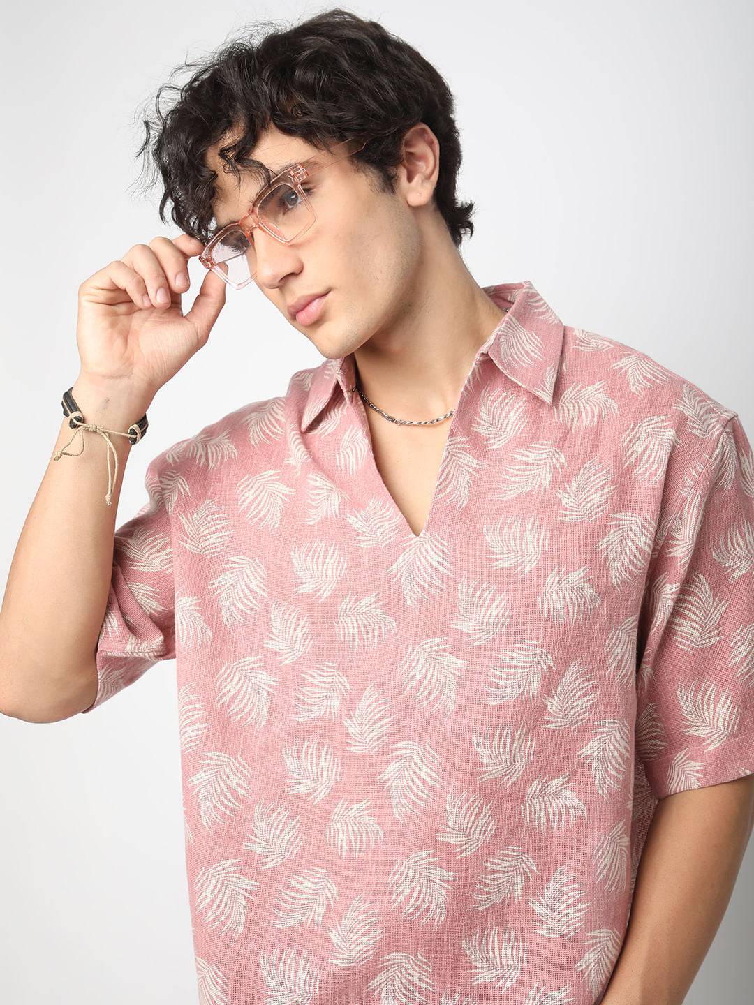 Peachy Pink Coco Leaf Printed Burlap Oversized Polo Shirt Buy only at ₹759