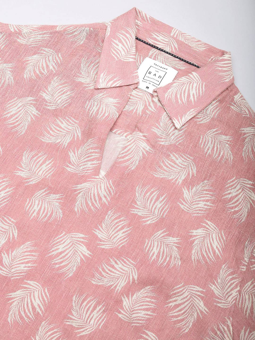 Peachy Pink Coco Leaf Printed Burlap Oversized Polo Shirt Buy only at ₹759