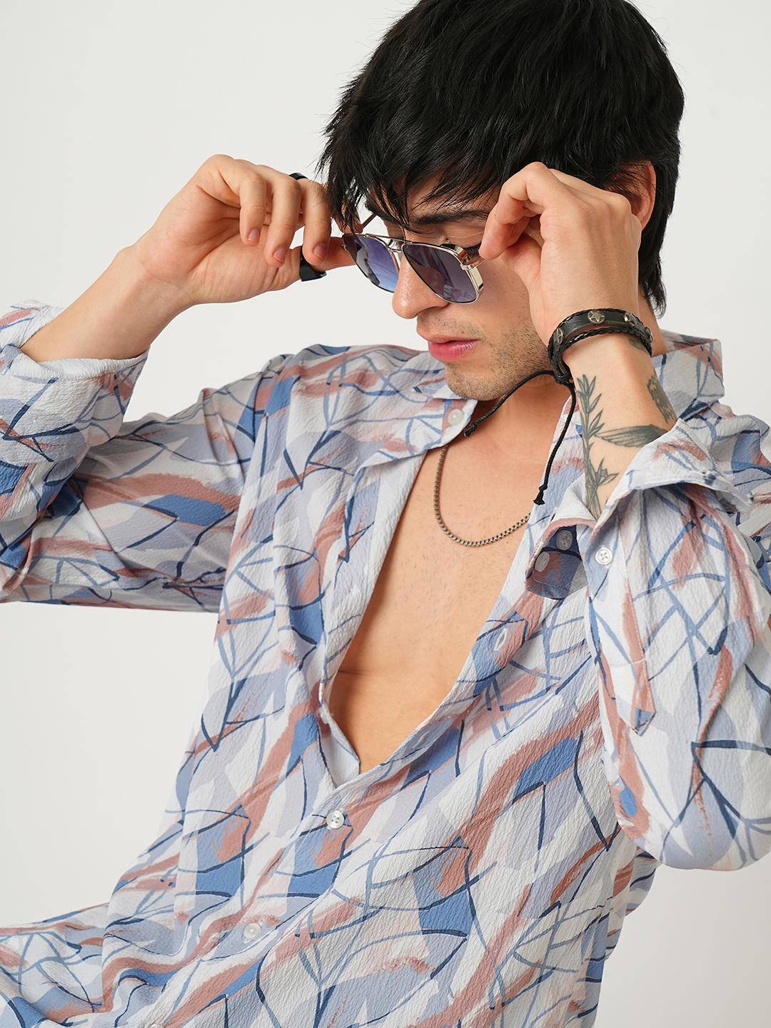 Voguish Abstract Printed Crushed Shirt Buy only at ₹659