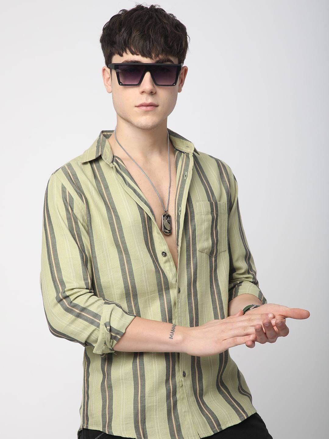 Alluring Tea Green Striped Shirt Buy only at ₹759