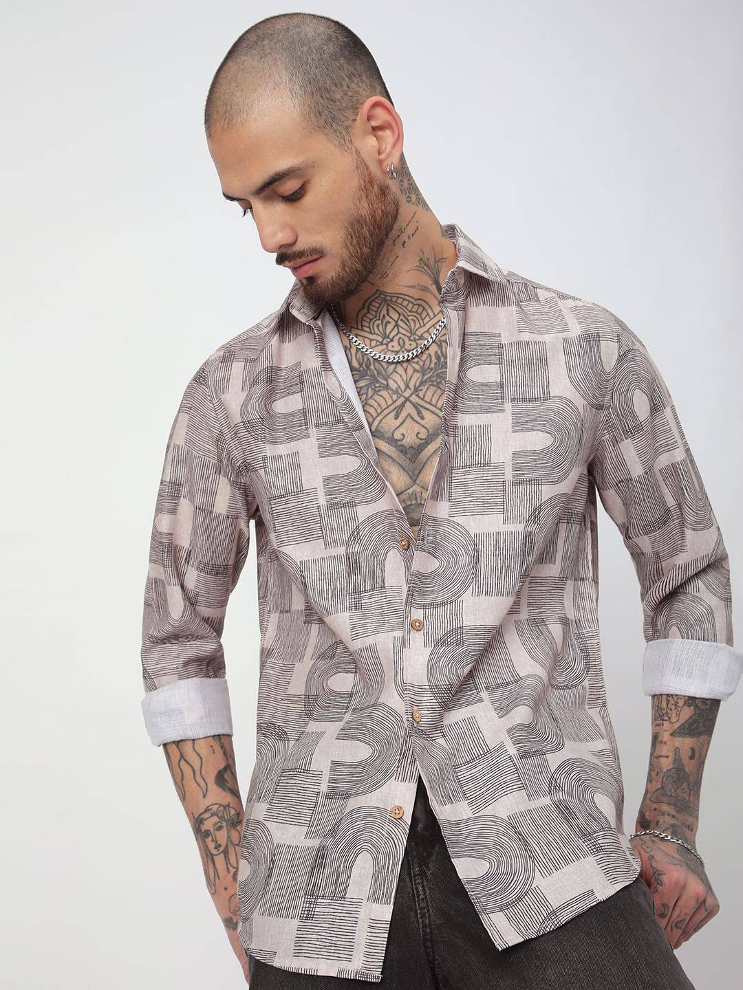 Beige & Navy Abstract Printed Shirt Buy only at ₹494