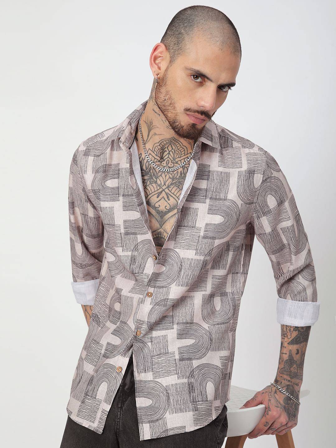 Beige & Navy Abstract Printed Shirt Buy only at ₹494