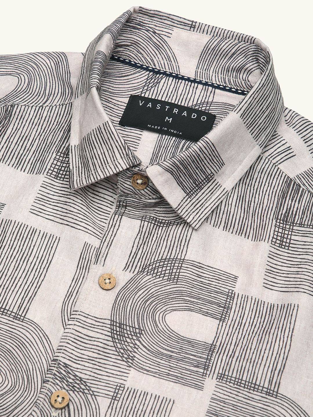 Beige & Navy Abstract Printed Shirt Buy only at ₹494