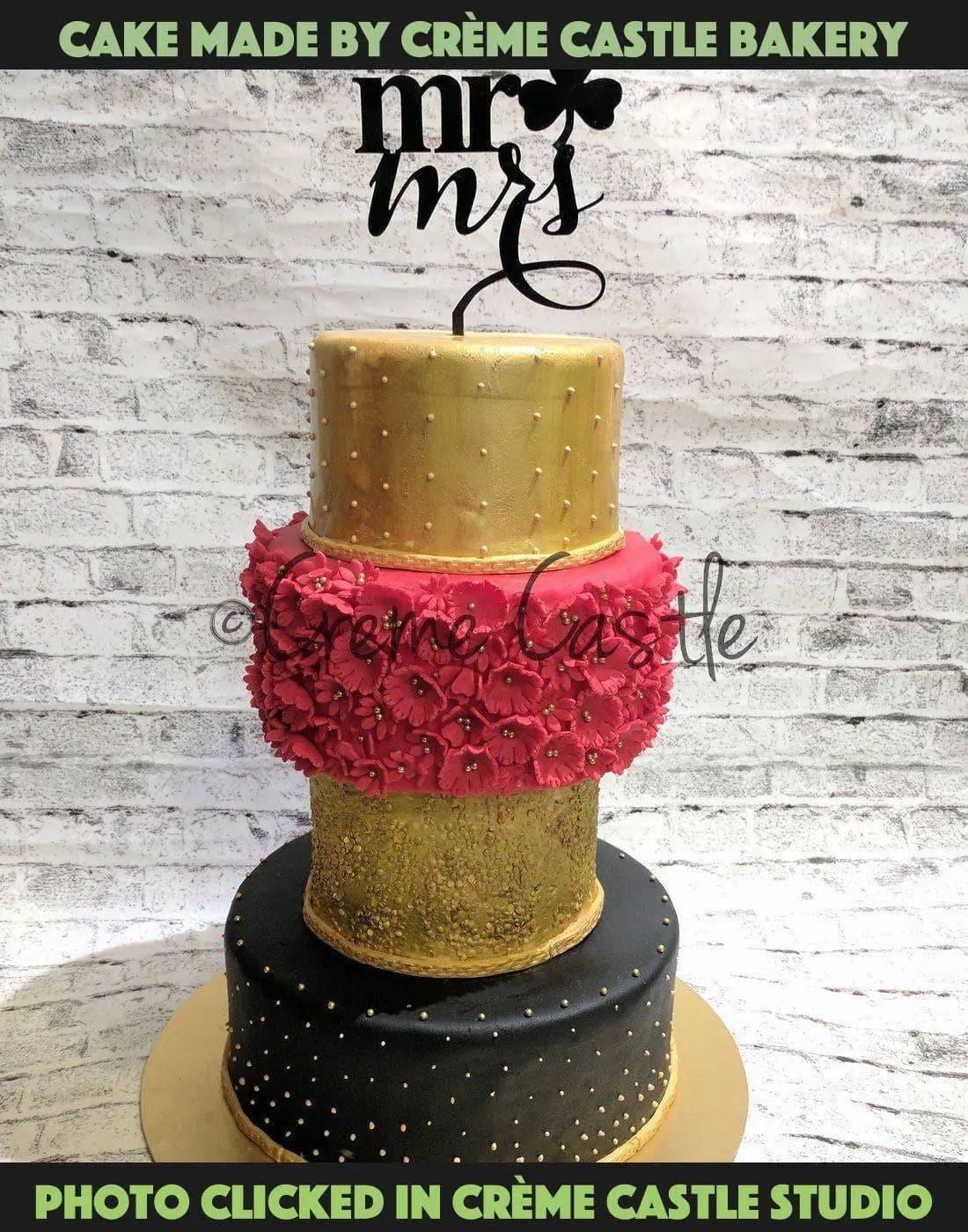 Red and golden wedding cake