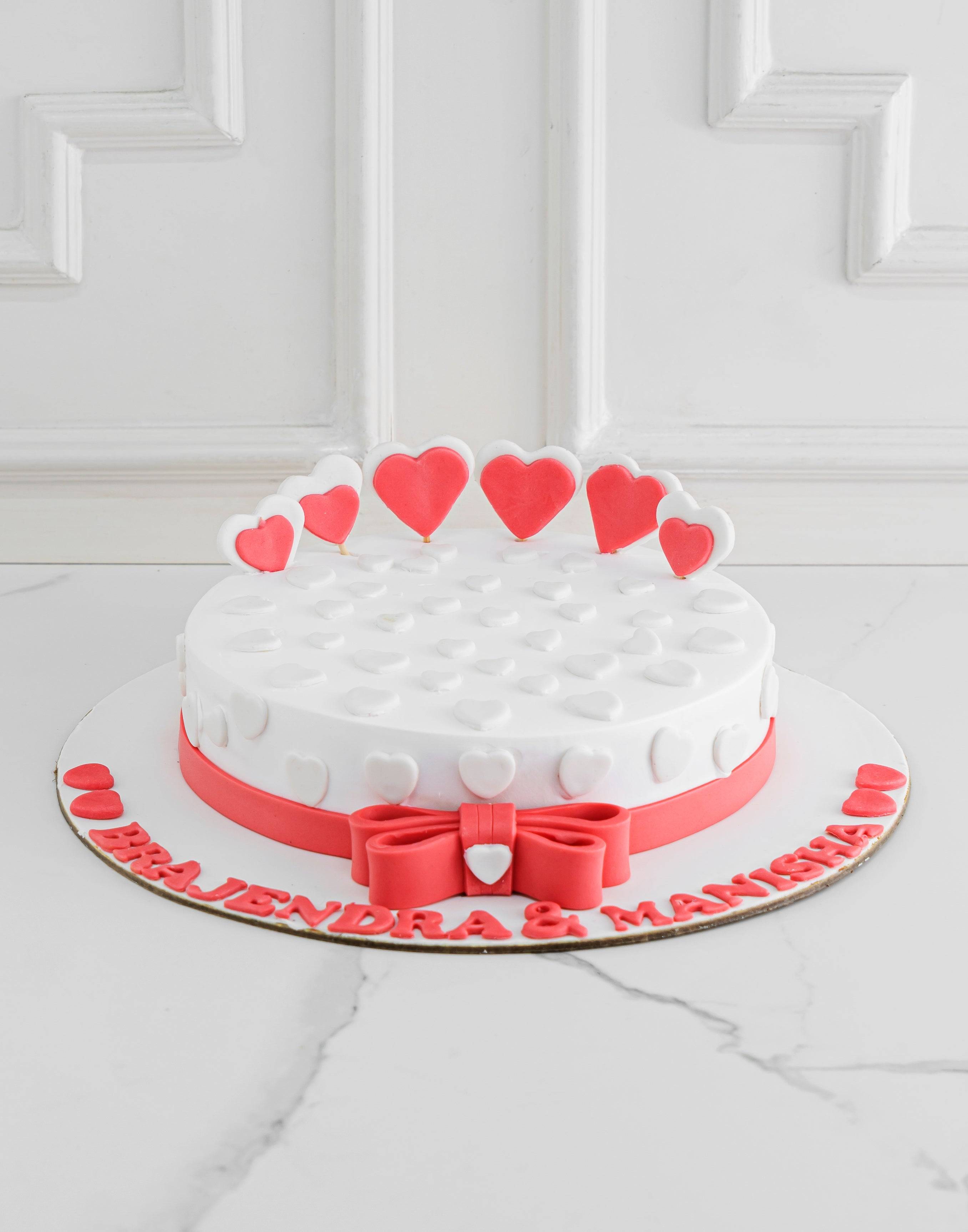 Pink Hearts on White Cake