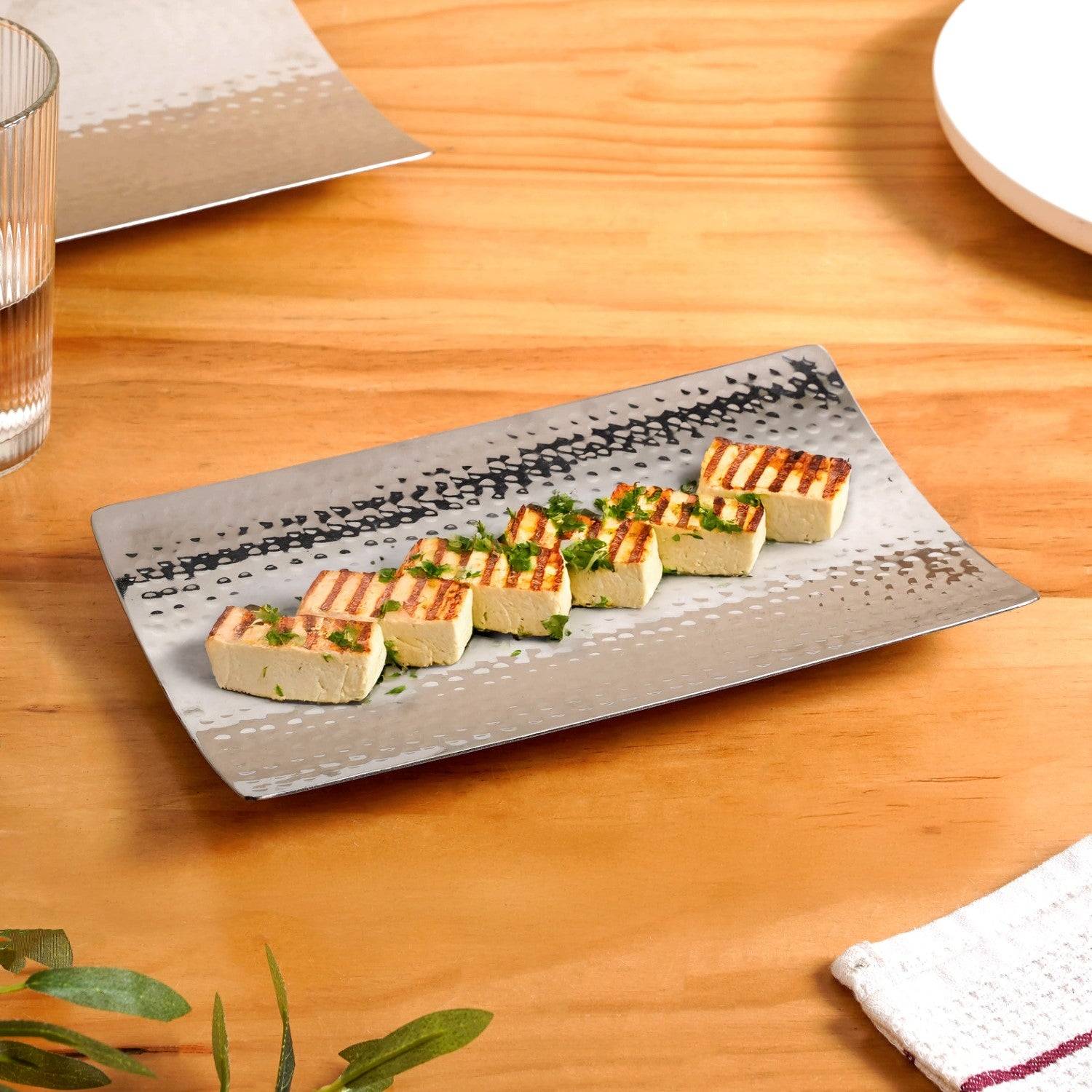 Curved Stainless Steel Hammered Food Platter 25x15cm buy only at ₹625