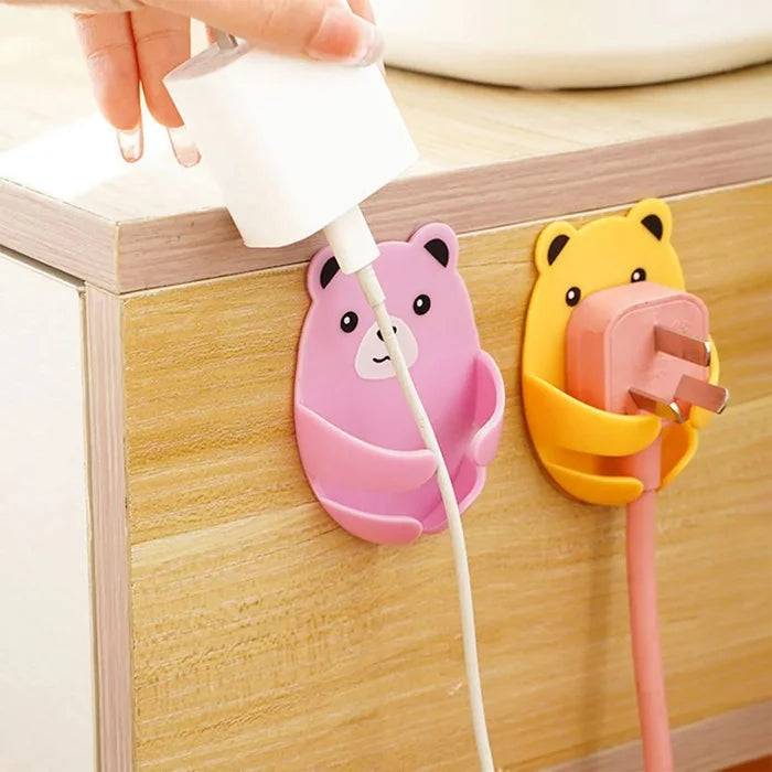 4 Pcs Bear Shaped Plug Holder – Cute Wall Socket Protector & Organizer (Random colors) Buy @ ₹79