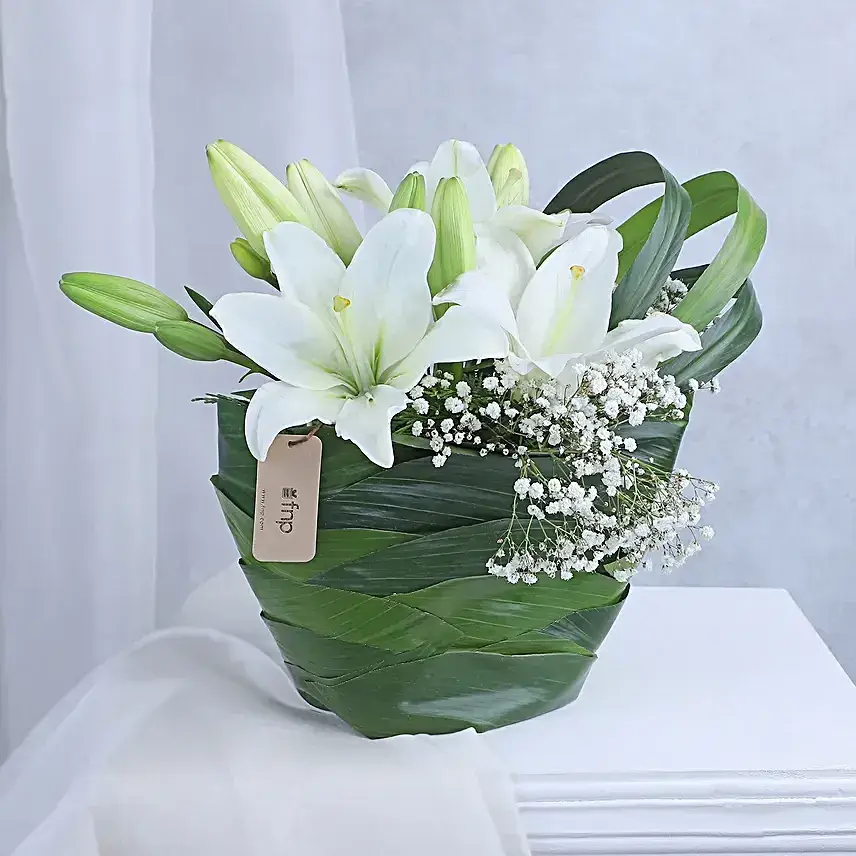 Angel In White Floral Arrangement