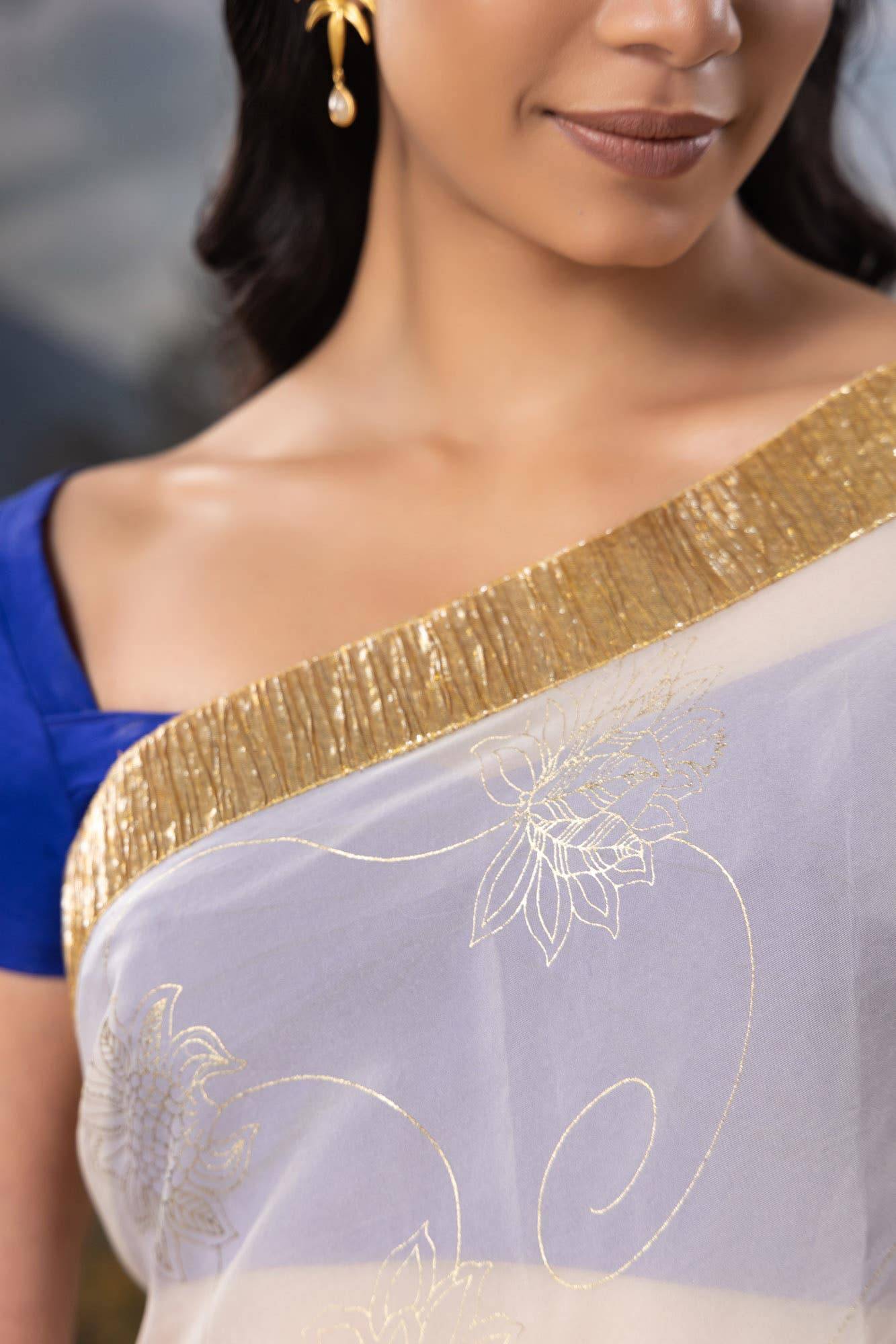 Runes of Gold-White Organza Silk Saree Buy at ₹7999