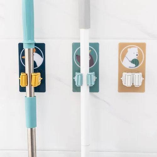 Cartoon Sticker Mop Holder – Wall-Mounted Cleaning Tool Organizer for Broom, Mop & Household Tools (Pack of 1) Buy @ ₹49