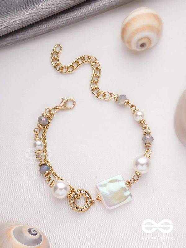 CLASSIC IVORY ALLURE - GOLDEN EMBELLISHED BRACELET WITH ANTI TARNISH COATING