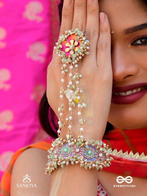 RANGOLIKA - A CANVAS OF COLORS - PEARLS, COLORFUL BEADS AND GOLDEN  HAND EMBROIDERD HATHPHOOL