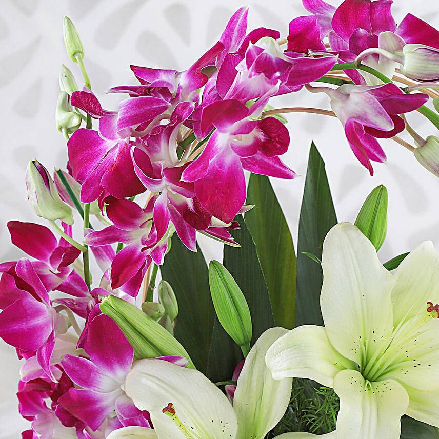 Lilies And Orchids Basket Arrangement