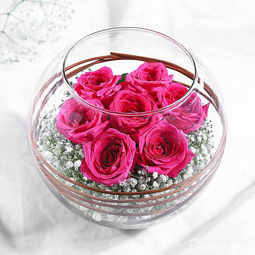 Lovely Pink Roses In Glass Vases