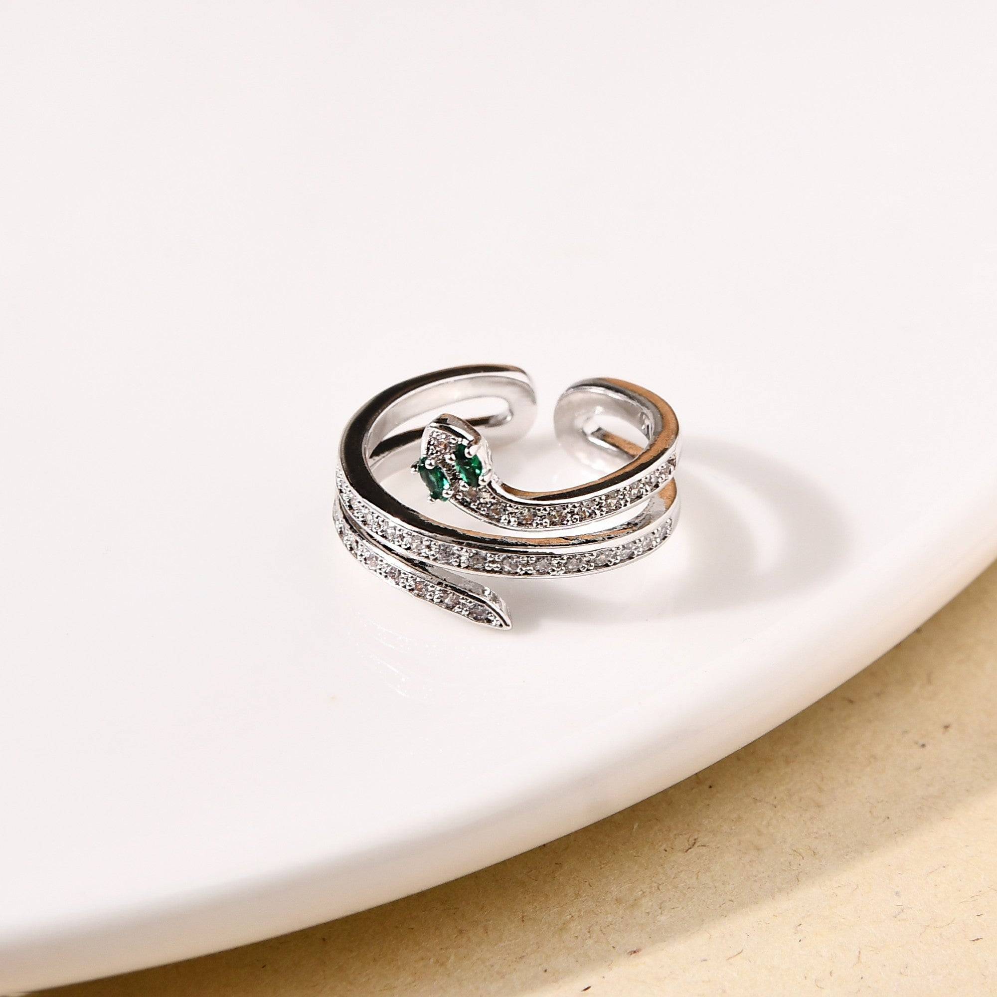 Stone Serpent Ring With Emerald Eyes