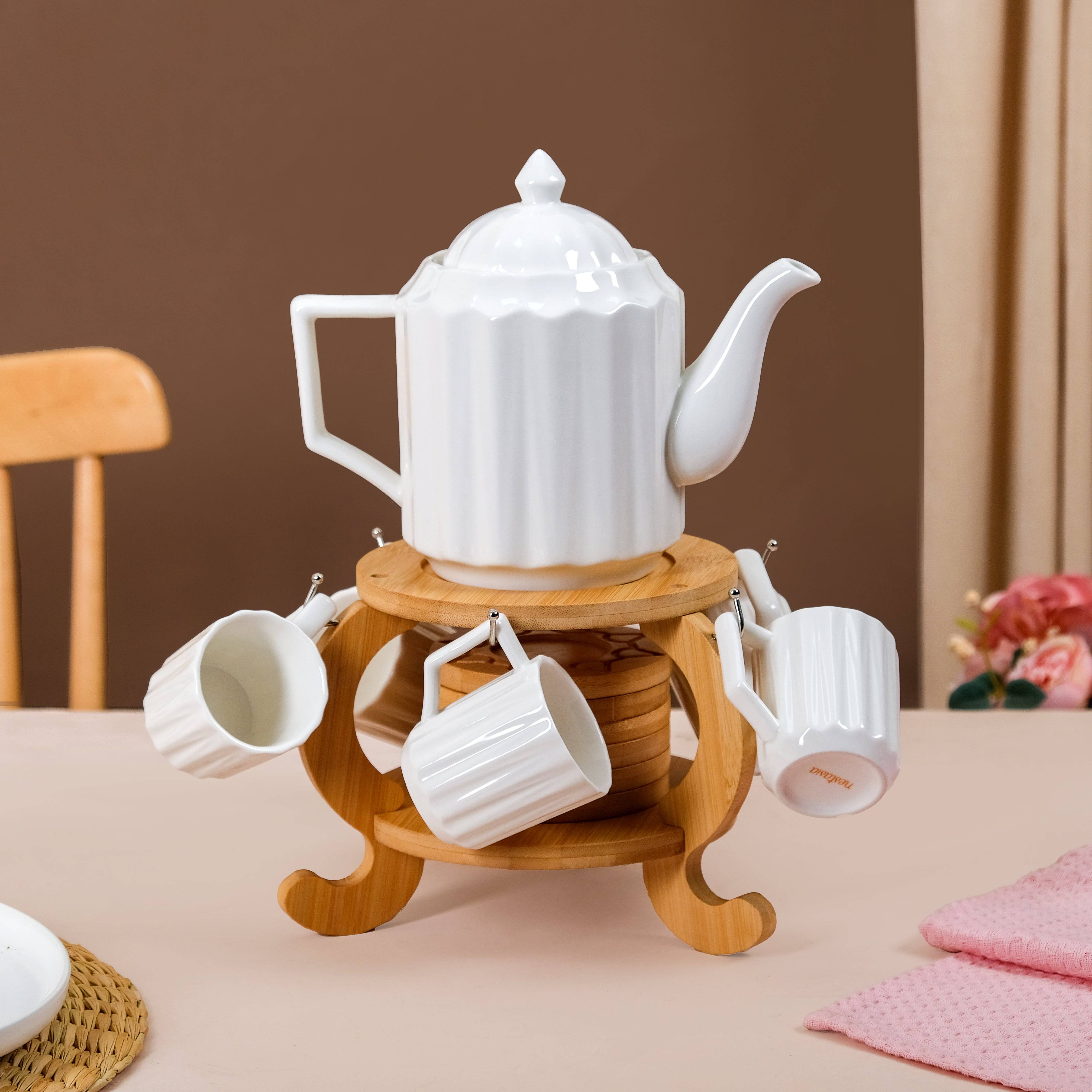 Blanca Fluted Ceramic Tea Set With 6 Cups Kettle And Wooden Stand buy only at ₹4190
