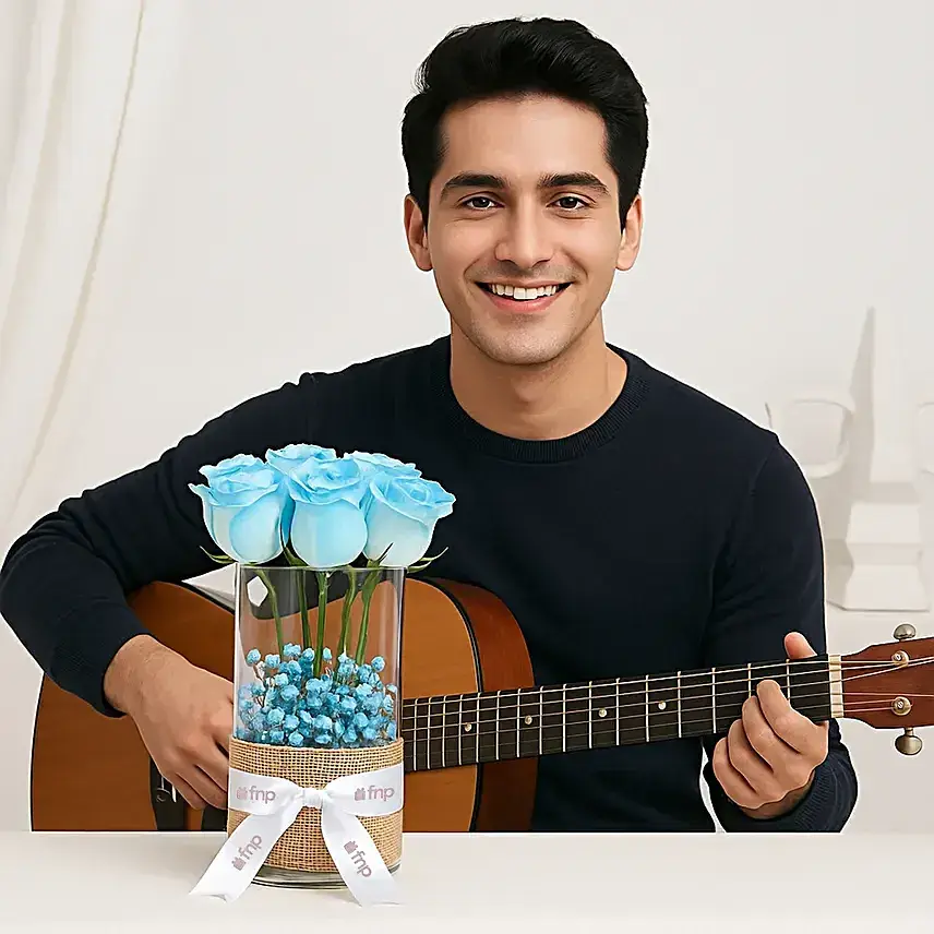 Surprise Guitarist With Blue Roses
