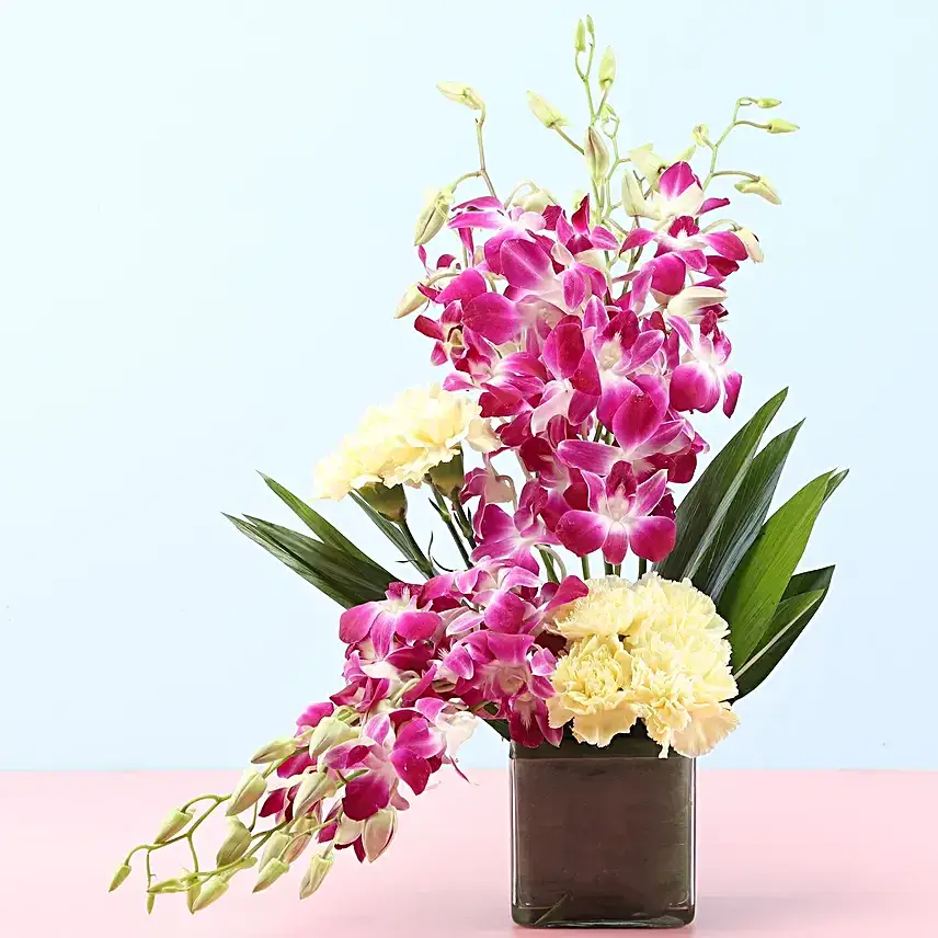 Yellow Carnations & Orchids In Vase